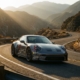 Sports car with visible suspension components navigating sharp mountain curve during golden hour sunset lighting.
